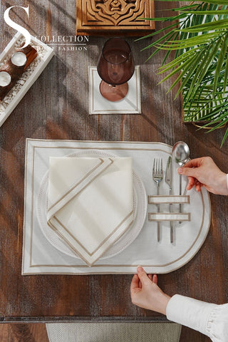 طقم مفارش سفرة - تصميم دورا - تطريز بني فاتح (كابتشينو) - قماش مقاوم للماء - ٦ اشخاص - ١٨ قطعة - طقم كامل  