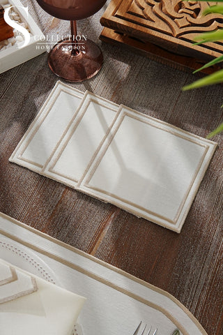 طقم مفارش سفرة - تصميم دورا - تطريز بني فاتح (كابتشينو) - قماش مقاوم للماء - ٦ اشخاص - ١٨ قطعة - طقم كامل  